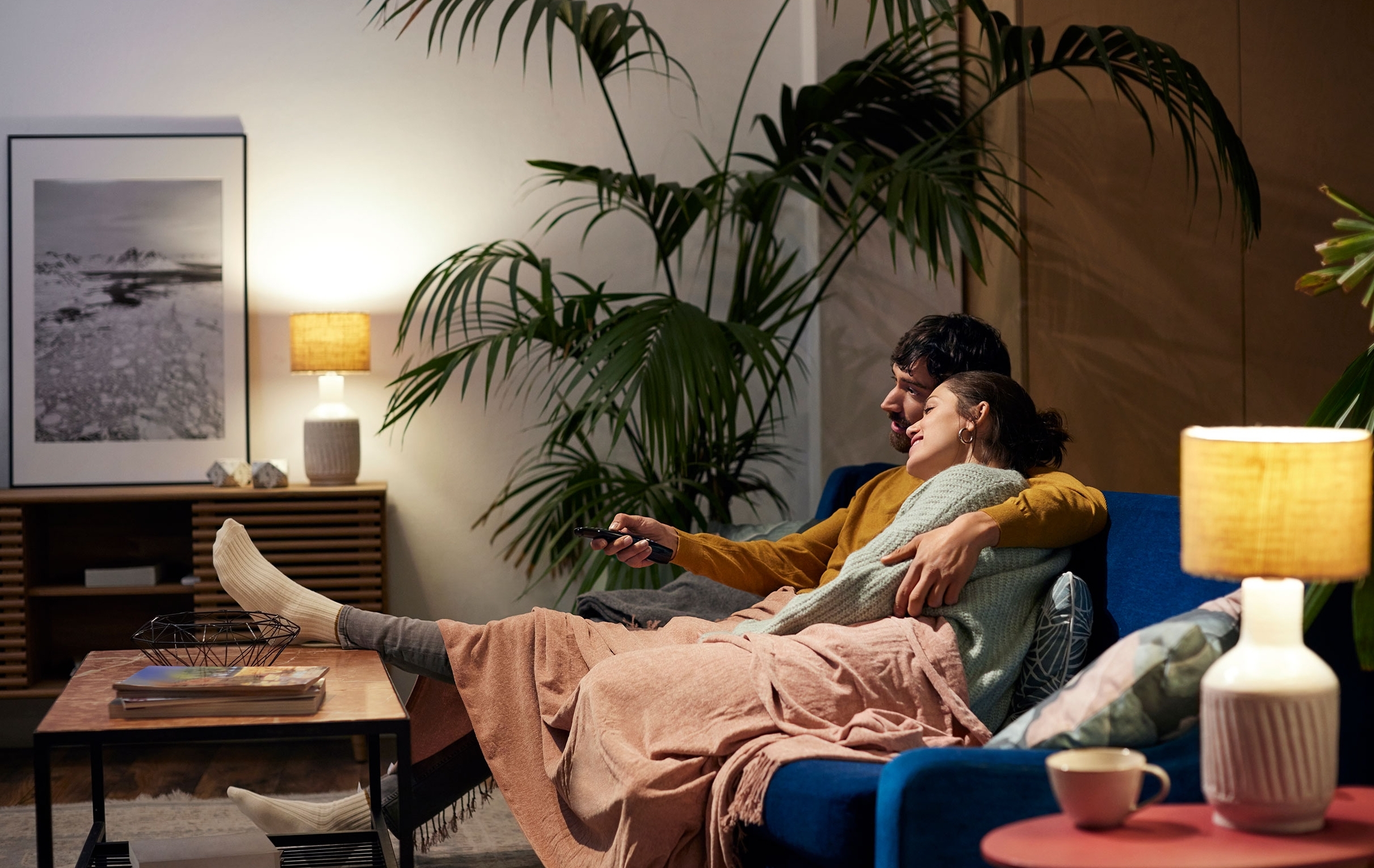 Image of a couple sitting on a couch